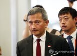 북 매체 "리용호 외무상과 발라크리쉬난 싱가포르 외무장관 회담"