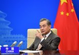 왕이 中 외교부장 "중국공산당, 세계에 은혜 베풀어"