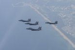 공군 F-15K, '6·25 격전지' 상공 초계 비행…호국선열을 기리며 연합 방위 태세 과시