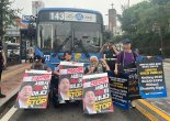 전장연, 서울 혜화 버스 차로 점거…10분간 출근길 시위