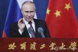 중국 방문한 푸틴, 시진핑과 ‘올림픽 휴전’ 논의했다