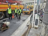 돌곶이역 땅꺼짐 신고…싱크홀 아닌 '깊이5㎝ 도로파임'