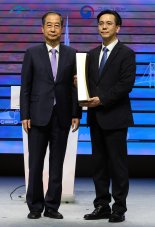 60개국 1462억달러 수주 대기록…현대건설 '해외건설의 탑' 받았다