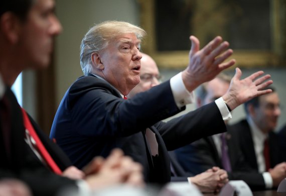 U.S. President Donald Trump speaks at a meeting with leaders of the steel and aluminum industries at the White House in Washington, DC on March 1, 2018. Trump announced planned tariffs on imported steel and aluminum during the meeting, with details to be released at a later date. Photo by Win McName