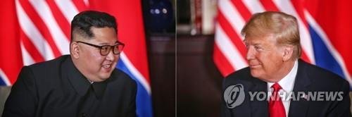 역사적 첫 북미정상회담이 열린 12일 오전 싱가포르 센토사 섬 카펠라호텔에서 북한 김정은 국무위원장(왼쪽)과 미국 도널드 트럼프 대통령이 단독회담을 하고 있다.연합뉴스
