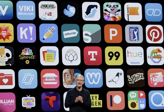 FILE - In this Monday, June 4, 2018 file photo, Apple CEO Tim Cook speaks during an announcement of new products at the Apple Worldwide Developers Conference in San Jose, Calif. Since its debut 10 years ago Tuesday, July 10, 2018, Apple’s app store has unleashed new ways for us to work, play, and be