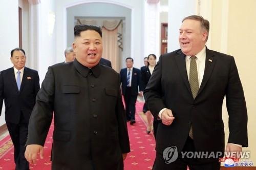 In this photo provided by the North Korean government, North Korean leader Kim Jong Un, center left, and U.S. Secretary of State Mike Pompeo walk together before their meeting in Pyongyang, North Korea, Sunday, Oct. 7, 2018.AP연합뉴스