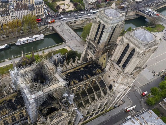 An image made available by Gigarama.ru on Wednesday April 17, 2019 shows an aerial shot of the fire damage to Notre Dame cathedral in Paris on Tuesday April 16. Nearly $1 billion has already poured in from ordinary worshippers and high-powered magnates around the world to restore Notre Dame Cathedra
