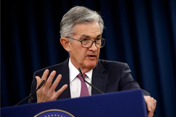 In this Wednesday, May 1, 2019, file photo, Federal Reserve Board Chair Jerome Powell speaks at a news conference following a two-day meeting of the Federal Open Market Committee, in Washington. Powell says a sharp rise in corporate debt is being closely monitored but currently the Fed does not see 