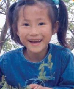 윤지현씨(28·실종 당시 8세)는 오른쪽 눈밑에 점이 있고, 얼굴이 약간 검은 편이 특징이다./사진=실종아동전문기관 제공