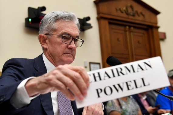 Federal Reserve Chairman Jerome Powell sits down to testify before the House Financial Services Committee on Capitol Hill in Washington, Wednesday, July 10, 2019. (AP Photo/Susan Walsh)