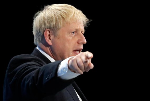 Conservative party leadership candidate Boris Johnson delivers his speech during a Conservative leadership hustings at ExCel Centre in London, Wednesday, July 17, 2019. The two contenders, Jeremy Hunt and Boris Johnson are competing for votes from party members, with the winner replacing Prime Minis