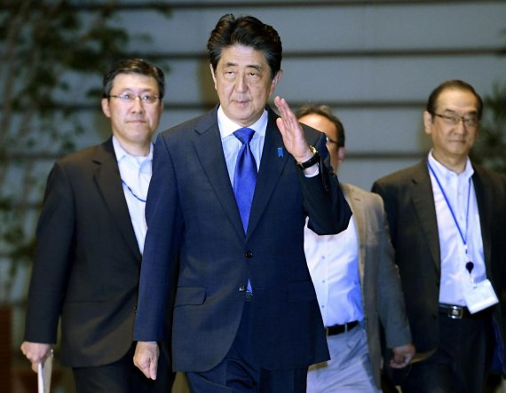Japan's Prime Minister Shinzo Abe arrives at his official residence after an earthquake, in Tokyo, Japan June 18, 2019, in this photo taken by Kyodo. Mandatory credit Kyodo/via REUTERS ATTENTION EDITORS - THIS IMAGE WAS PROVIDED BY A THIRD PARTY. MANDATORY CREDIT. JAPAN OUT. NO COMMERCIAL OR EDITORI