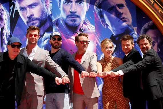 FILE PHOTO: Actors Robert Downey Jr., Chris Evans, Mark Ruffalo, Chris Hemsworth, Scarlett Johansson, Jeremy Renner and Marvel Studios President Kevin Feige pose for a picture during a ceremony to place their handprints in cement at the TCL Chinese Theatre in Hollywood, Los Angeles, California, U.S.