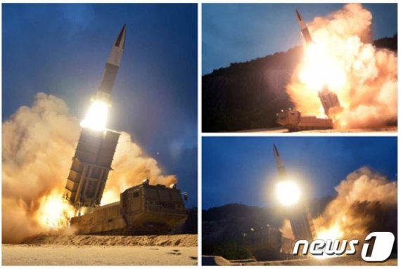 북한이 김정은 국무위원장 참관 아래 지난 10일 새 무기 시험사격을 했다며 공개한 사진 (노동신문)© 뉴스1