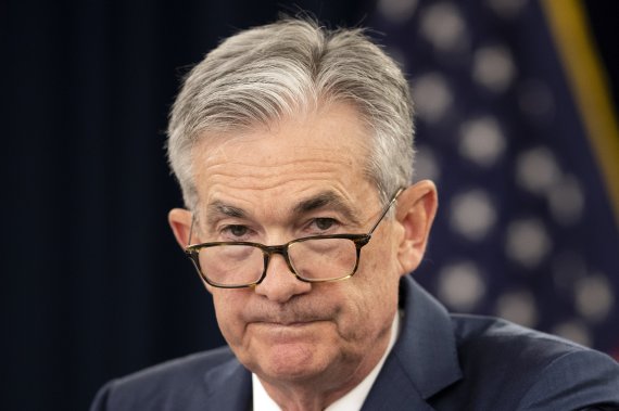 FILE - In this July 31, 2019, file photo, Federal Reserve Chairman Jerome Powell speaks during a news conference following a two-day Federal Open Market Committee meeting in Washington. President Donald Trump is calling on the Federal Reserve to cut interest rates by at least a full percentage-point