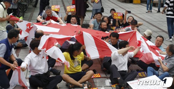 北매체 日올림픽 욱일기 반입, 아시아인에 대한 모독