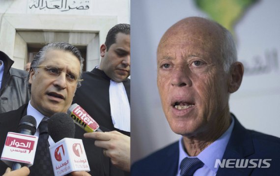 【튀니스(튀니지)=AP/뉴시스】지난 15일 열린 튀니지 대통령선거에서 1, 2위로 결선투표에 진출한 무소속 헌법학자 카이스 아이에드(오른쪽)와 수감 중인 방송사 대표 나빌 카로우이. 튀니지 선거 당국은 17일 사이에드와 카로우이가 각각 18.4%와 15.6%의 득표율로 1, 2위를 차지했다고 발표했다. 2019.9.18