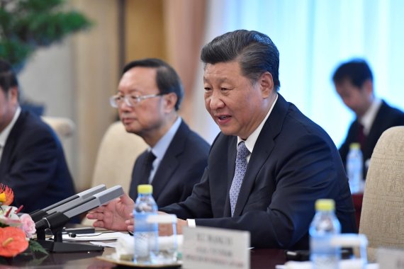 Chinese President Xi Jinping talks to Solomon Islands Prime Minister Manasseh Sogavare (not pictured) during their meeting at the Diaoyutai State Guesthouse in Beijing, China, October 9, 2019. Parker Song/Pool via REUTERS