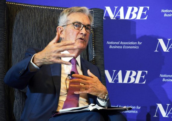 Federal Reserve Chairman Jerome Powell speaks at the National Association for Business Economics conference in Denver on Tuesday, Oct. 8, 2019. Powell said that U.S. job growth since early last year was not as robust as thought, a hint that the Fed may be ready to keep cutting interest rates to supp