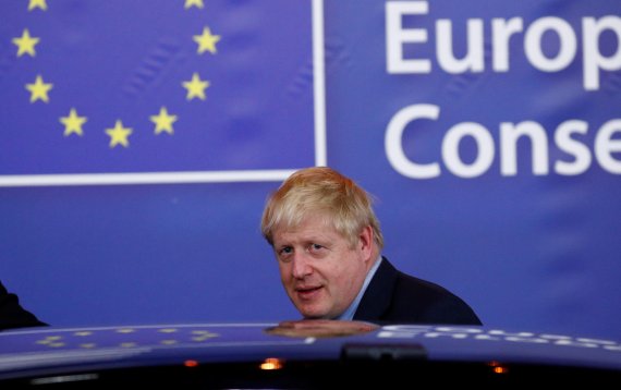 Britain's Prime Minister Boris Johnson leaves the European Council after the Brexit-dominated European Union leaders summit in Brussels, Belgium October 18, 2019. REUTERS/Francois Lenoir