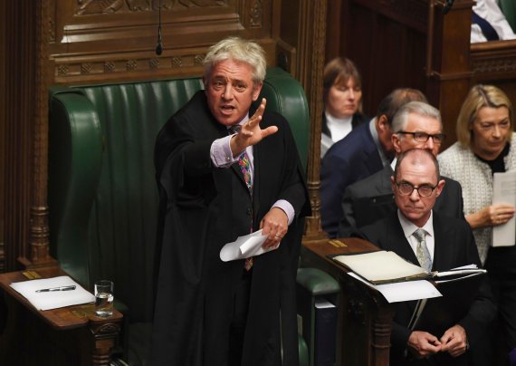 Speaker of Britain's House of Commons John Bercow gestures during a debate after giving a statement in the House of Commons in London Monday Oct. 21, 2019. The government request for a meaningful vote on the government's Brexit deal with Europe is rejected Monday by Speaker Bercow. (Jessica Taylor/H