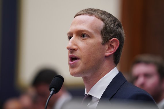 (191023) -- WASHINGTON, Oct. 23, 2019 (Xinhua) --Facebook chief executive Mark Zuckerberg testifies before the U.S. House Financial Services Committee during An Examination of Facebook and Its Impact on the Financial Services and Housing Sectors hearing on Capitol Hill in Washington D.C., the United