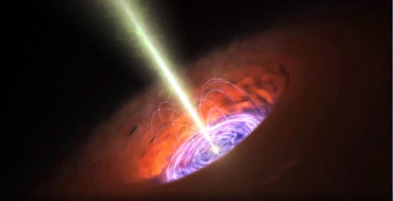 은하 중심부에 먼지(붉은 색 원환면)에 둘러싸인 있는 초대질량 블랙홀이 기체를 부착(가운데 푸른색 원반)하면서 제트(녹색)를 방출하는 모습의 상상도. ESO 제공