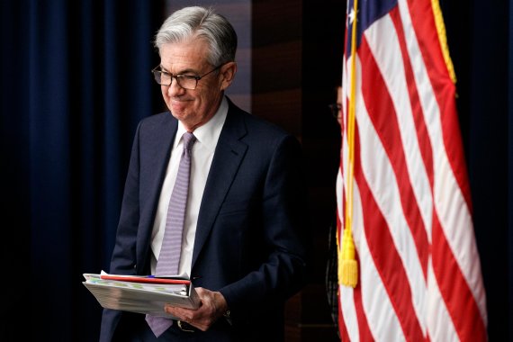 In this Dec. 11, 2019, file photo Federal Reserve Chair Jerome Powell arrives to speak at a news conference after the Federal Open Market Committee meeting in Washington. On Thursday, Jan. 2, 2020, the Federal Reserve releases minutes from its December meeting when it kept its key interest rate unch