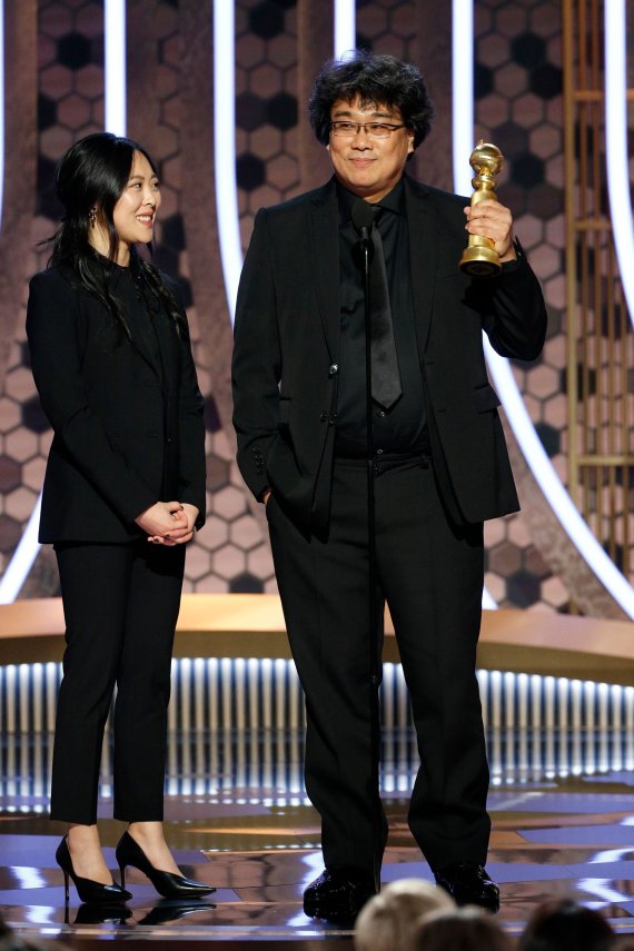 77th Golden Globe Awards - Show - Beverly Hills, California, U.S., January 5, 2020 - Bong Joon Ho accepts the award for Best Motion Picture, Foreign Language for 'Parasite.' Paul Drinkwater/NBCNBC Universal/Handout via REUTERS For editorial use only. Additional clearance required for commercial or p