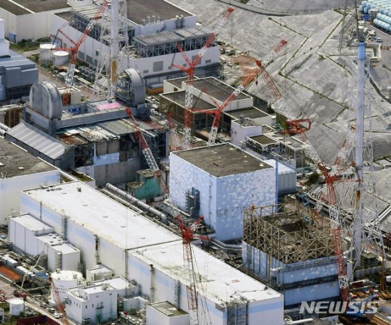 [오쿠마=AP/뉴시스] 일본 후쿠시마현 오쿠마에 있는 후쿠시마 원전의 2017년 9월 4일월 모습. 일본 정부는 원전 오염수의 해양방출을 추진하고 있다. 2019.12. 29