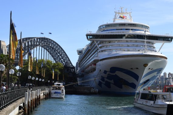 Princess Cruises-owned Ruby Princess is pictured docked at Circular Quay during the disembarkation of passengers in Sydney, Australia, March 19, 2020. Picture taken March 19, 2020. AAP Image/Dean Lewins/via REUTERS ATTENTION EDITORS - THIS IMAGE WAS PROVIDED BY A THIRD PARTY. NO RESALES. NO ARCHIVE.