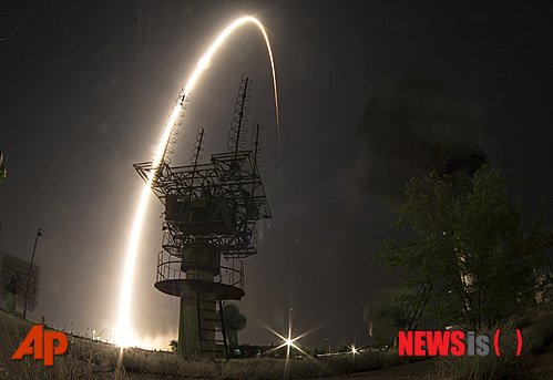 [바이코누르(카자흐스탄)=AP/뉴시스] 29일(현지시간) 카자흐스탄의 바이코누르 우주기지에서 러시아 우주왕복선 소유스 TMA-13M을 실은 소유즈 FG가 발사되고 있다. 2014.05.29
