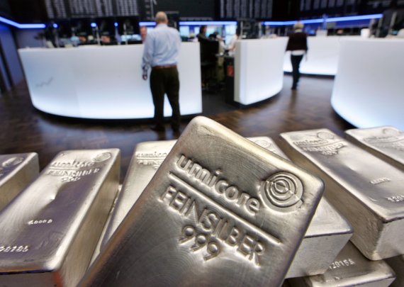 FILE - In this file photo dated Wednesday, May 9, 2007, Silver bullion, bars weighing five kilograms each, are displayed in the trading room of the stock exchange in Frankfurt, Germany. Silver futures jumped more than 10% on Monday Feb. 1, 2021, following strong gains over the weekend.(AP Photo/Mich