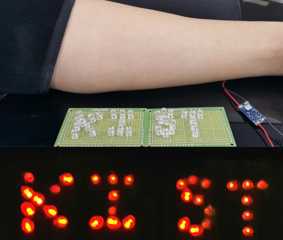 한국과학기술연구원 전북분원 복합소재기술연구소 김진상 분원장팀이 고효율 유연 열전모듈을 이용해 LED 등을 30분간 켜는데 성공했다. KIST 제공