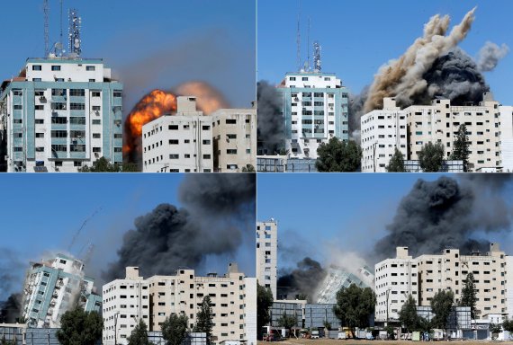 지난 15일(현지시간) 팔레스타인 가자지구에서 주요 외신들이 입주한 알 잘라 타워가 이스라엘군의 공습으로 무너지고 있다.로이터뉴스1