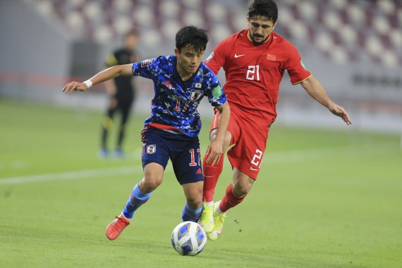 [도하=AP/뉴시스]일본이 중국을 꺾고 월드컵 최종예선 첫 승에 성공했다. 2021.09.07.