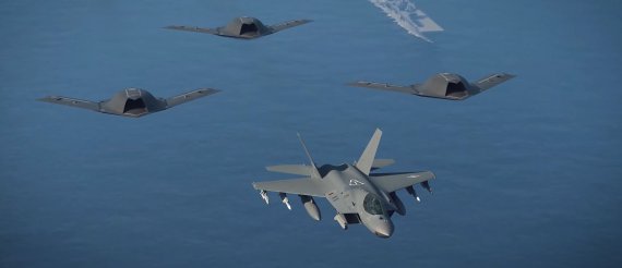 KF-21 '보라매' 전투기(맨 앞)과 무인 전투기 편대 컴퓨터그래픽 (방위사업청 제공) © 뉴스1