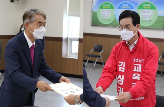 [창원=뉴시스] 홍정명 기자= 6월 1일 경남도교육감선거에 출마하는 박종훈(왼쪽) 현 교육감과 김상권 전 도교육청 교육국장이 12일 오전 경남도선관위에 후보자등록을 하고 있다. 2022.05.12. hjm@newsis.com