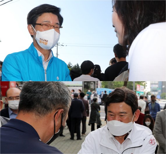 이석문 제주교육감 후보(사진 위쪽)와 김광수 후보가 지지자들과 인사를 나누고 있다 © 뉴스1