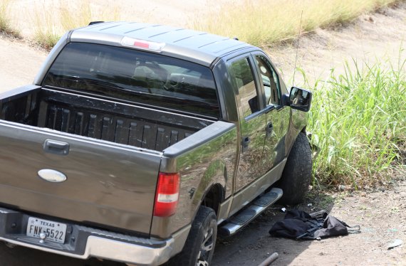 The vehicle used by 18-year-old Salvador Ramos is seen crashed in a ditch near Robb Elementary School where Ramos killed nineteen children and two adults in a mass shooting in Uvalde, Texas, U.S. May 24, 2022. Picture taken May 24, 2022. Pete Luna/Uvalde Leader-News/Handout via REUTERS THIS IMAGE HA