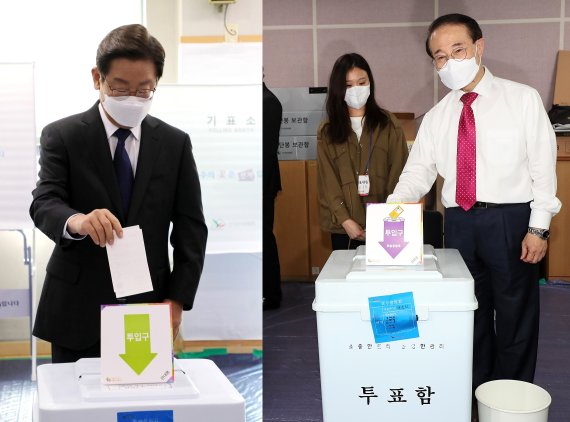 사전투표하는 이재명 더불어민주당 후보(왼쪽), 윤형선 국민의힘 후보(오른쪽)2022.5.28/뉴스1 © News1 박아론 기자