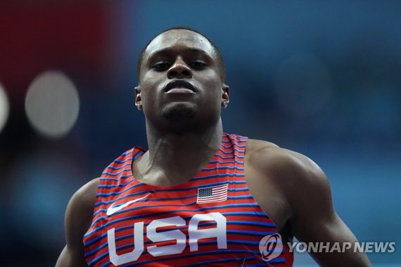 디펜딩챔피언 콜먼 FILE - Christian Coleman, of the United States, finishes a men's 60 meters heat at the World Athletics Indoor Championships in Belgrade, Serbia, Saturday, March 19, 2022. American sprinter Christian Coleman is steadily getting up to speed after an 18-month ban that kept him out of the Toky