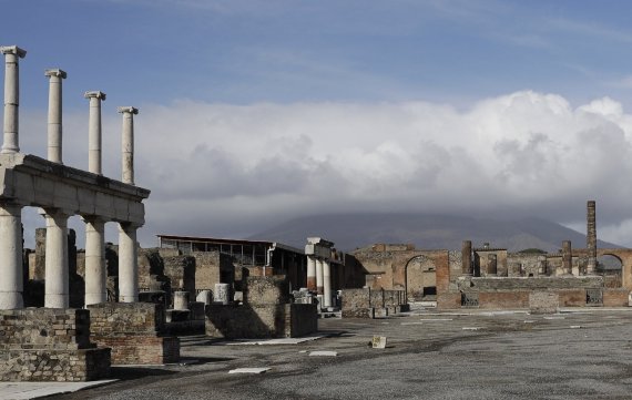 FILE - Clouds hang over the Vesuvius volcano in Pompeii, southern Italy, Jan. 25, 2021. An American tourist had to be rescued on Mount Vesuvius near Naples after he apparently slipped into the volcano’s crater while trying to recover his fallen cellphone, news reports and the association of Vesuvius