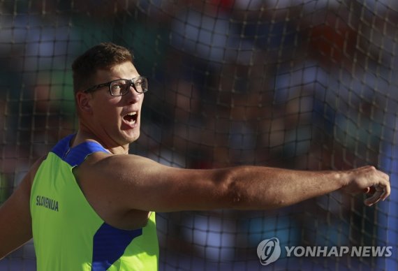 체흐, 남자 원반던지기 대회신기록 세우며 우승 epa10081078 Gold medalist Kristjan Ceh of Slovenia competes in the Men's Discus Throw final at the World Athletics Championships Oregon22 at Hayward Field in Eugene, Oregon, USA, 19 July 2022. EPA/Robert Ghement