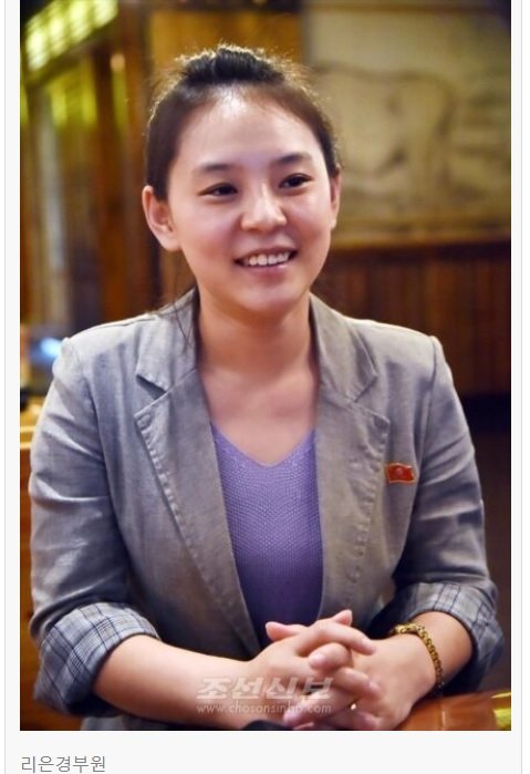 [서울=뉴시스]북한 삼계탕집 직원 리은경씨. 2022.08.07. (사진=조선신보 누리집 갈무리) *재판매 및 DB 금지