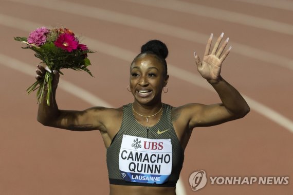 카마초-퀸, 여자 100ｍ 허들 우승 Jasmine Camacho-Quinn of Puerto Rico celebrates after winning the 110 meters Hurdles Women race at the Athletissima IAAF Diamond League international athletics meeting in the Stade Olympique de la Pontaise in Lausanne, Switzerland, Friday, Aug. 26, 2022. (Salvatore Di Nolfi/Keys