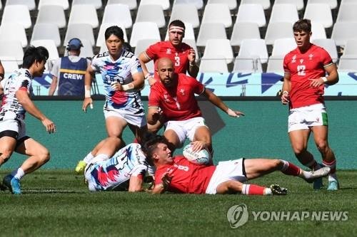 지난 9일 대회 첫 경기를 치른 한국과 웨일스 7인제 럭비대표팀 [AFP=연합뉴스]