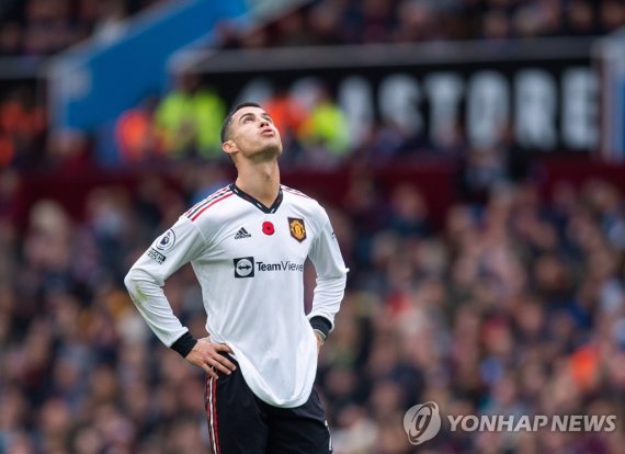 epa10291459 Manchester United's Cristiano Ronaldo reacts after the English Premier League soccer match between Aston Villa FC and Manchster United FC at Villa Park in Birmingham, Britain, 06 November 2022. EPA/PETER POWELL EDITORIAL USE ONLY. No use with unauthorized audio, video, data, fixture list