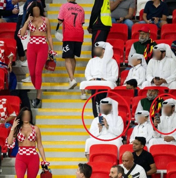 '노출 의상'을 입은 여성 축구팬을 촬영하는 카타르 현지 남성들. /사진=트위터 '트롤 풋볼'